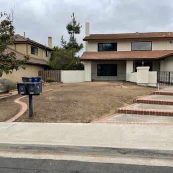 house exterior before landscape remodeled